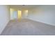 Spacious carpeted bonus room, offering versatility and an open layout, awaits your personal touch at 5709 White Trillium Loop, Land O Lakes, FL 34639