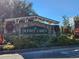 Stone entryway sign for Dupree Lakes, decorated with holiday wreaths at 5709 White Trillium Loop, Land O Lakes, FL 34639