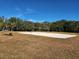 Community sand volleyball court ready for a friendly game at 5709 White Trillium Loop, Land O Lakes, FL 34639