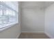Walk-in closet featuring wire shelving and a window offering natural light at 5709 White Trillium Loop, Land O Lakes, FL 34639