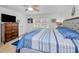 Inviting bedroom featuring an accent wall and a large window for natural light at 5817 Park N St # 204, St Petersburg, FL 33709