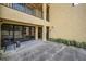 Building entrance with seating and landscaping at 5817 Park N St # 204, St Petersburg, FL 33709
