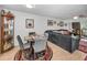 Open dining area with seating for four and hardwood floors at 5817 Park N St # 204, St Petersburg, FL 33709