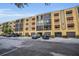 Condo building with parking and landscaping at 5817 Park N St # 204, St Petersburg, FL 33709