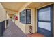 Clean and well-lit hallway leading to condo unit at 5817 Park N St # 204, St Petersburg, FL 33709