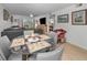 Comfortable living room featuring hardwood floors and plenty of natural light at 5817 Park N St # 204, St Petersburg, FL 33709