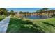 Serene pond with fountain in the community at 5817 Park N St # 204, St Petersburg, FL 33709
