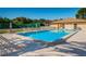 Refreshing community pool with plenty of lounge chairs at 5817 Park N St # 204, St Petersburg, FL 33709