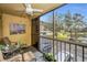Relaxing screened porch overlooking a scenic pond with neighborhood views at 5817 Park N St # 204, St Petersburg, FL 33709