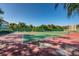 Active lifestyle: Well-maintained tennis court for outdoor recreation and exercise at 5817 Park N St # 204, St Petersburg, FL 33709