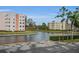 Condo buildings situated along a peaceful lake at 5817 Park N St # 204, St Petersburg, FL 33709