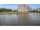 Condo building overlooking a calm lake at 5817 Park N St # 204, St Petersburg, FL 33709