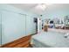 Bedroom with sliding doors to a closet and a light blue color scheme at 5820 43Rd N Ter # 1403, St Petersburg, FL 33709
