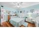 Bedroom with a view into the bathroom and a light blue color scheme at 5820 43Rd N Ter # 1403, St Petersburg, FL 33709