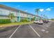 Building exterior with parking lot and landscaping at 5820 43Rd N Ter # 1403, St Petersburg, FL 33709