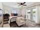 Main bedroom with pool view and modern furniture at 612 E Wheeler Rd, Seffner, FL 33584