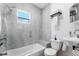 Bright bathroom with a tub and shower combination, offering a clean and functional space at 727 53Rd N Ter, St Petersburg, FL 33703