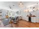 Spacious living room with a modern bar area and open floor plan to the kitchen at 727 53Rd N Ter, St Petersburg, FL 33703