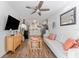 Cozy living room open to the kitchen, featuring stylish decor and wood-look floors at 727 53Rd N Ter, St Petersburg, FL 33703