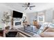 Cozy living area with a fireplace, comfortable seating, and lots of natural light at 727 53Rd N Ter, St Petersburg, FL 33703