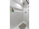 Contemporary shower showcasing white subway tiles, a built-in shelf, and modern fixtures at 727 53Rd N Ter, St Petersburg, FL 33703