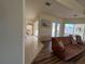 Living area with a view down the hallway to the bedrooms at 11405 Warm Wind Way, Weeki Wachee, FL 34613