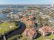 Aerial view of waterfront community adjacent to golf course at 1630 Royal Palm S Dr # A, St Petersburg, FL 33707