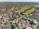 Aerial view showcasing community near golf course and waterfront at 1630 Royal Palm S Dr # A, St Petersburg, FL 33707