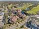 Aerial view of community with waterfront, golf course, and luxury homes at 1630 Royal Palm S Dr # A, St Petersburg, FL 33707