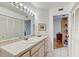Bathroom with vanity, toilet and access to a possible linen closet at 1630 Royal Palm S Dr # A, St Petersburg, FL 33707