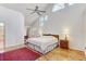 Spacious main bedroom with high ceilings, hardwood floors, and ample natural light at 1630 Royal Palm S Dr # A, St Petersburg, FL 33707