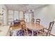 Elegant dining room with hardwood floors and a charming wooden table at 1630 Royal Palm S Dr # A, St Petersburg, FL 33707