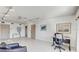 Gathering room with tiled floors, a desk area, and access to other rooms at 1630 Royal Palm S Dr # A, St Petersburg, FL 33707
