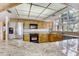 Modern kitchen with granite countertops and stainless steel appliances at 1630 Royal Palm S Dr # A, St Petersburg, FL 33707