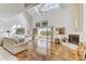Bright living room with hardwood floors, fireplace and access to balcony at 1630 Royal Palm S Dr # A, St Petersburg, FL 33707