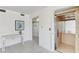 Building interior with tiled floor, elevator access and a decorative console table at 1630 Royal Palm S Dr # A, St Petersburg, FL 33707