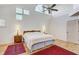 Spacious main bedroom with high ceilings and hardwood floors at 1630 Royal Palm S Dr # A, St Petersburg, FL 33707