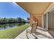 Waterfront patio with rocking chairs, ideal for relaxing at 1630 Royal Palm S Dr # A, St Petersburg, FL 33707