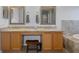 Double vanity bathroom with granite countertops and a soaking tub at 19301 Sandy Springs Cir, Lutz, FL 33558