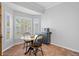 Bright breakfast nook with a round table and chairs, adjacent to kitchen at 19301 Sandy Springs Cir, Lutz, FL 33558