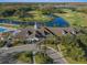 Community clubhouse near golf course and lake at 19301 Sandy Springs Cir, Lutz, FL 33558