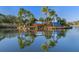 Heritage Harbor entrance with water features and palm trees at 19301 Sandy Springs Cir, Lutz, FL 33558