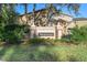 Brightwater community entrance sign with landscaping and brick pillars at 19301 Sandy Springs Cir, Lutz, FL 33558