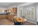 Kitchen features wood cabinets, granite counters, and stainless steel appliances at 19301 Sandy Springs Cir, Lutz, FL 33558