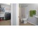 Convenient laundry room with washer, dryer, and utility sink at 19301 Sandy Springs Cir, Lutz, FL 33558