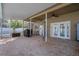 Screened patio with kitchen access and grill at 19301 Sandy Springs Cir, Lutz, FL 33558