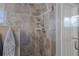 Large walk-in shower with tiled walls and modern fixtures at 19301 Sandy Springs Cir, Lutz, FL 33558