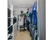 Spacious walk-in closet with ample shelving and hanging space at 19301 Sandy Springs Cir, Lutz, FL 33558