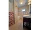Clean bathroom with a shower/tub combo and vanity at 4010 Belle Vista Dr, St Pete Beach, FL 33706