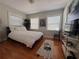 Bright bedroom with hardwood floors and ample closet space at 4010 Belle Vista Dr, St Pete Beach, FL 33706